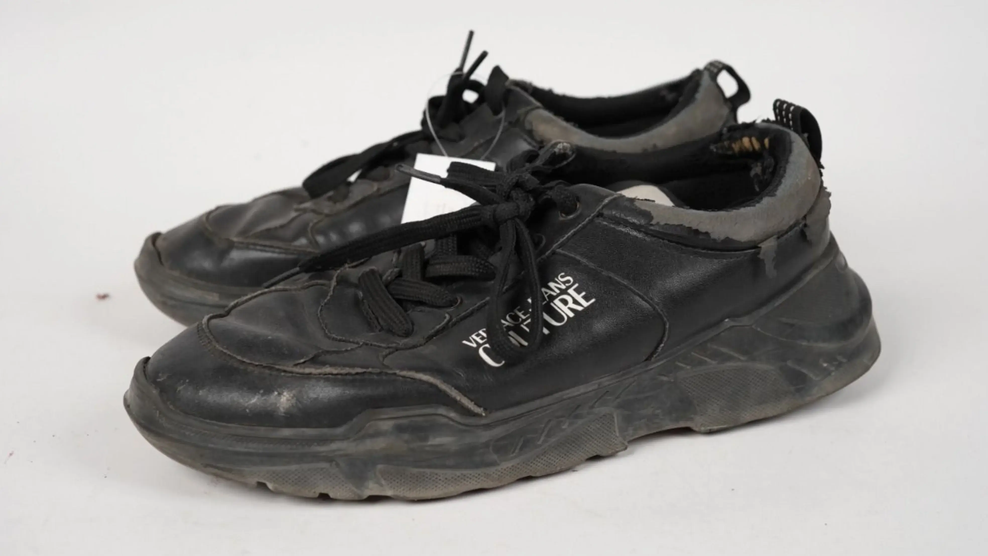 After Versace shoes restoration transformed into genuine leather finish with deep, even colour and pristine polish