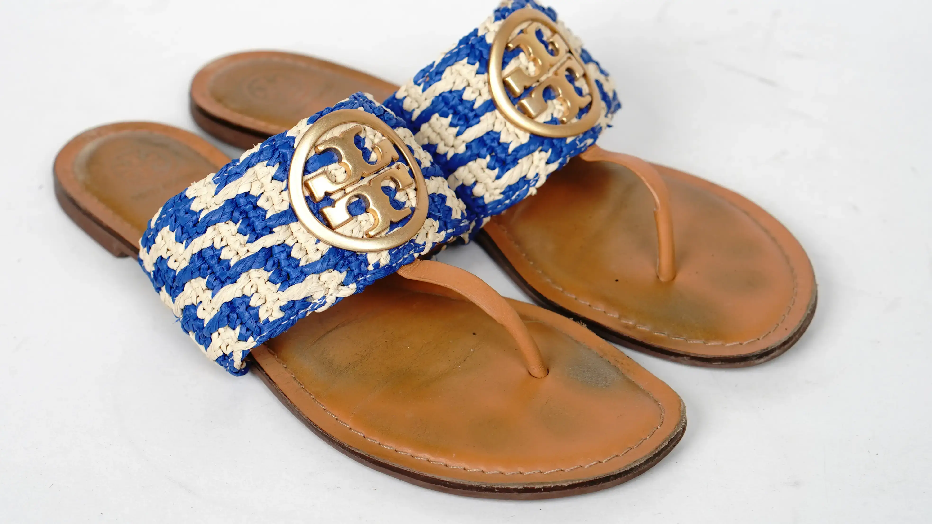 After Tory Burch slipper restoration renewed colour with smooth, polished finish