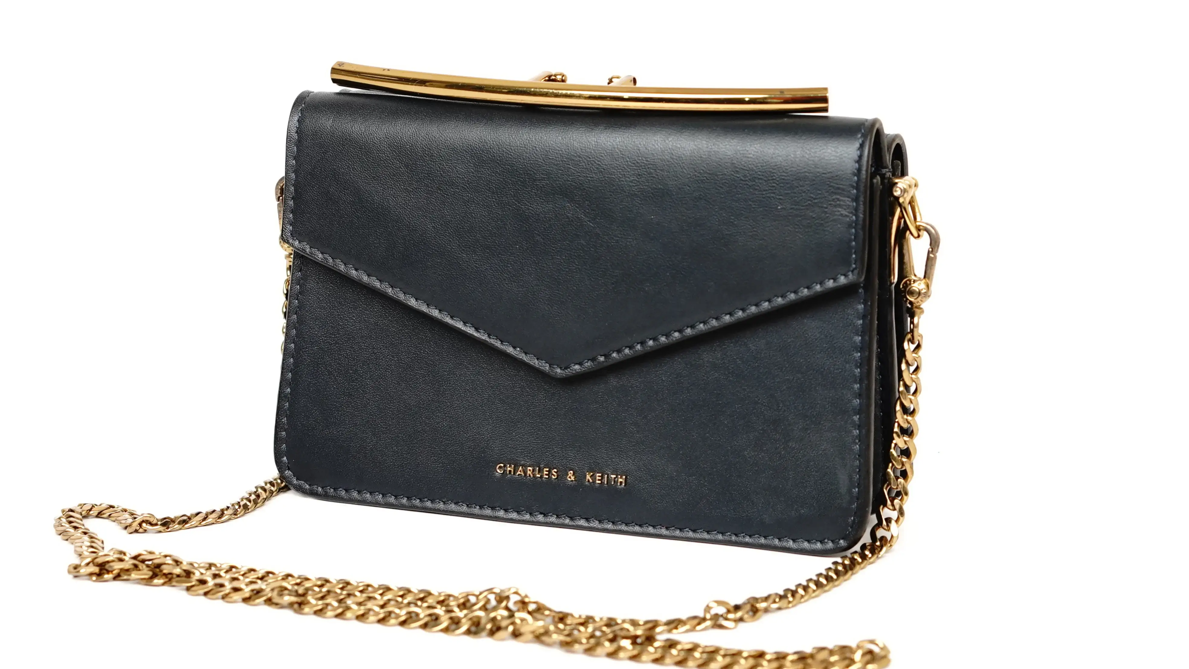 Before Charles & Keith sling bag restoration faded surface with discoloured tone