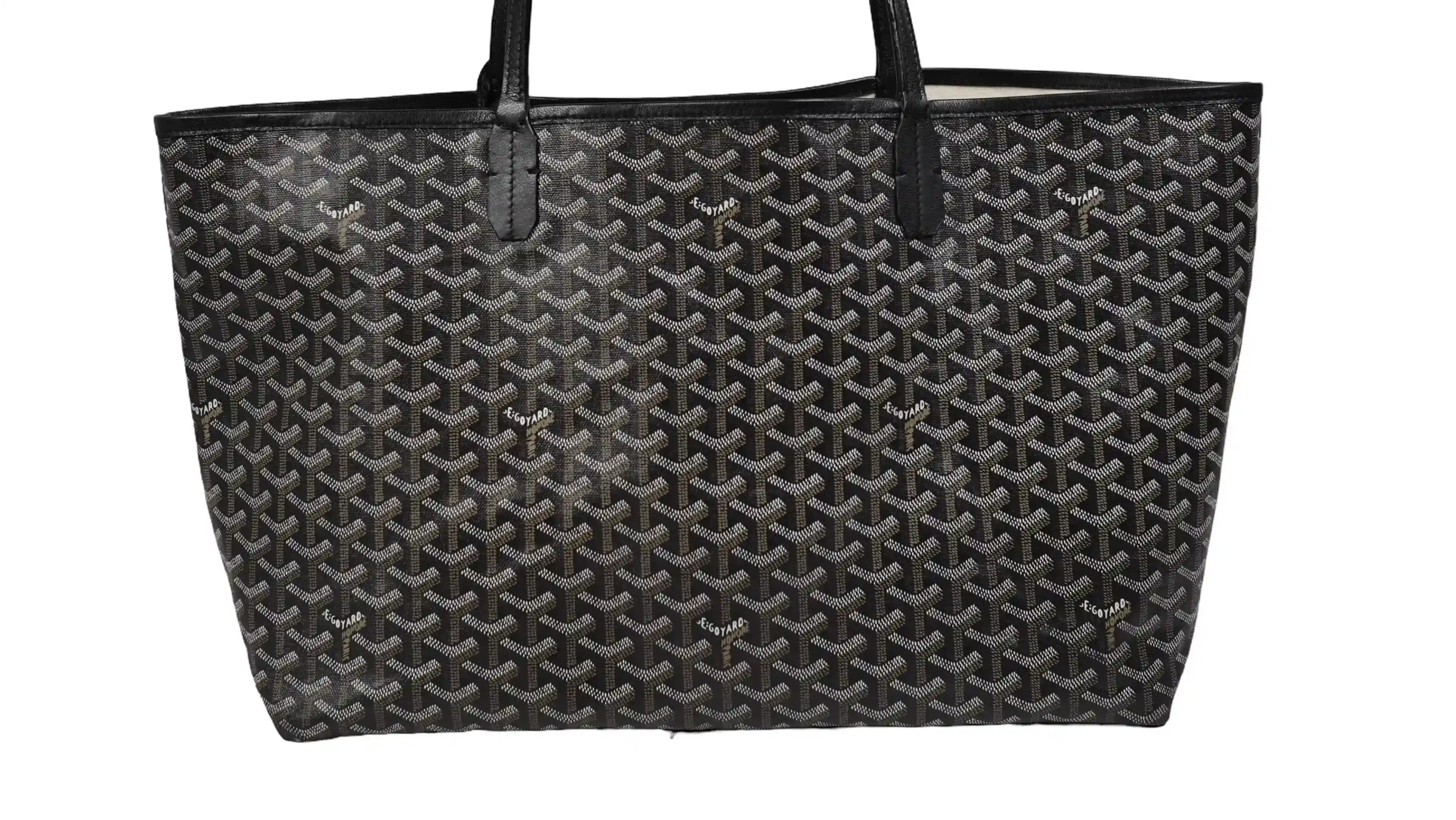 Before Goyard tote restoration severe water stains, fungus growth, and surface deterioration
