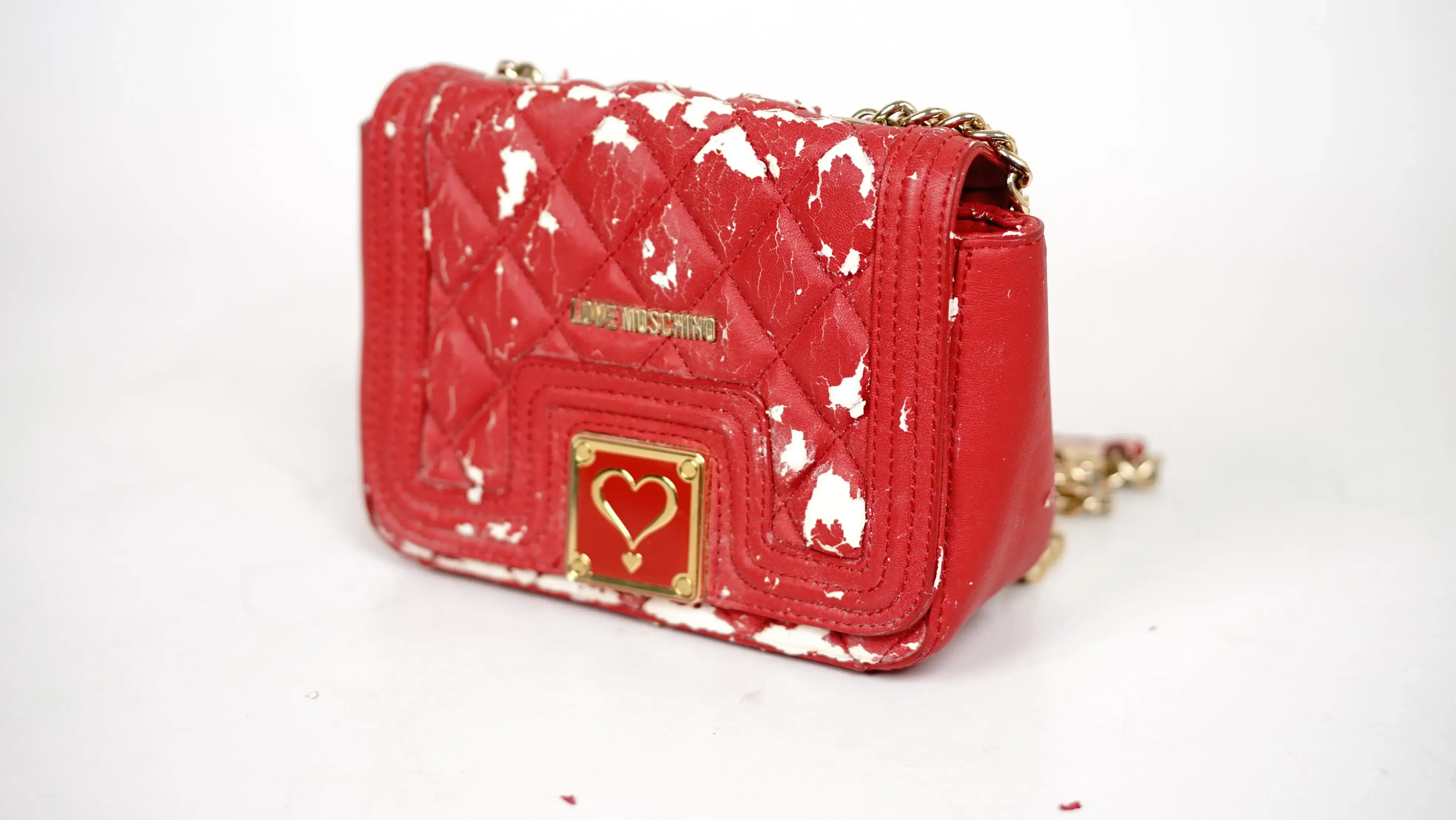 After Love Moschino bag restoration fully revived finish in genuine leather tone