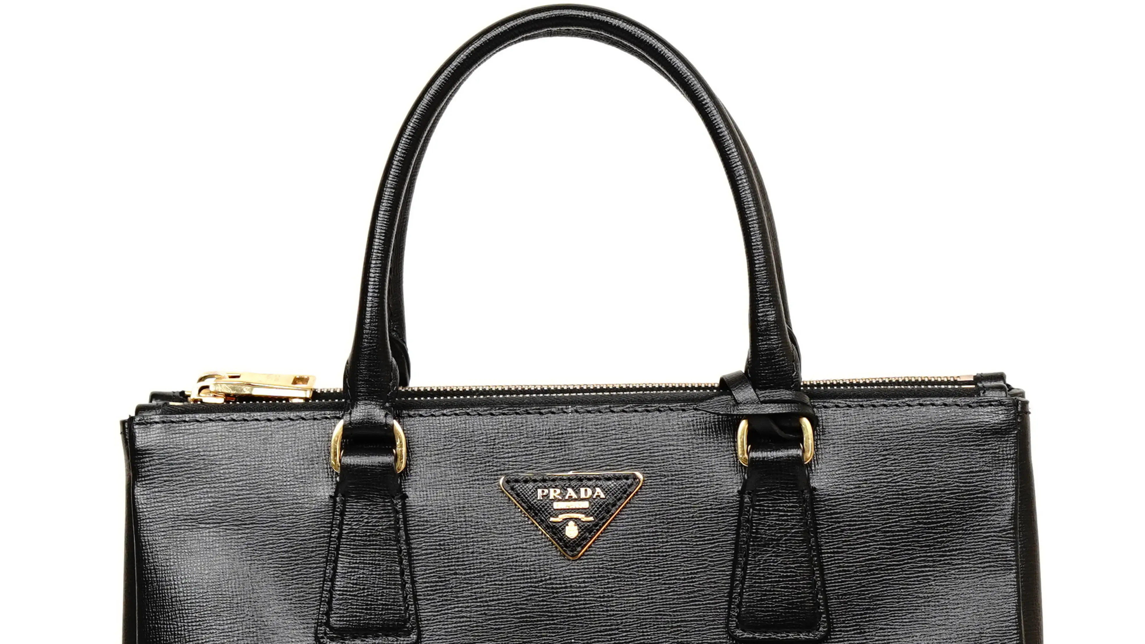 Before Prada bag restoration cracked handles and faded leather tone